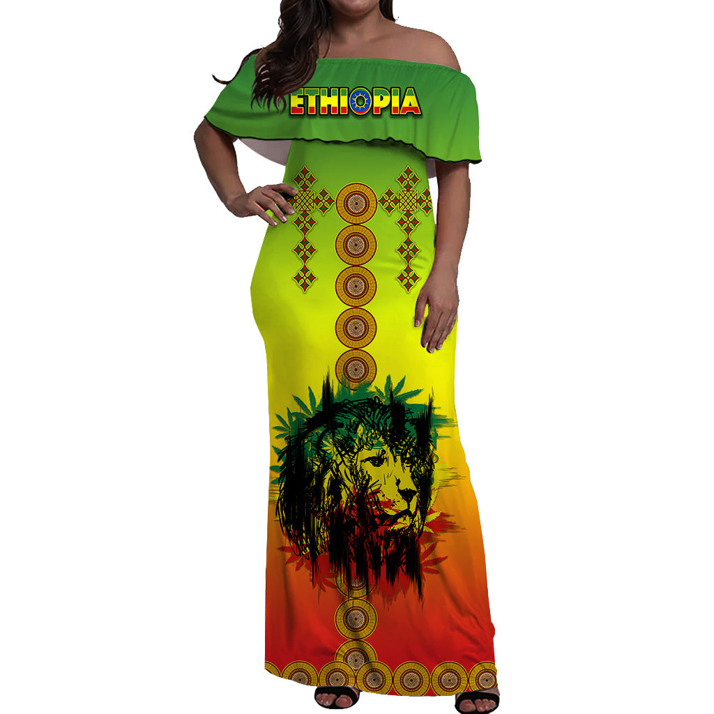 Off-shoulder maxi dress: green ruffle neckline, yellow-green with lion graphic and medallions
