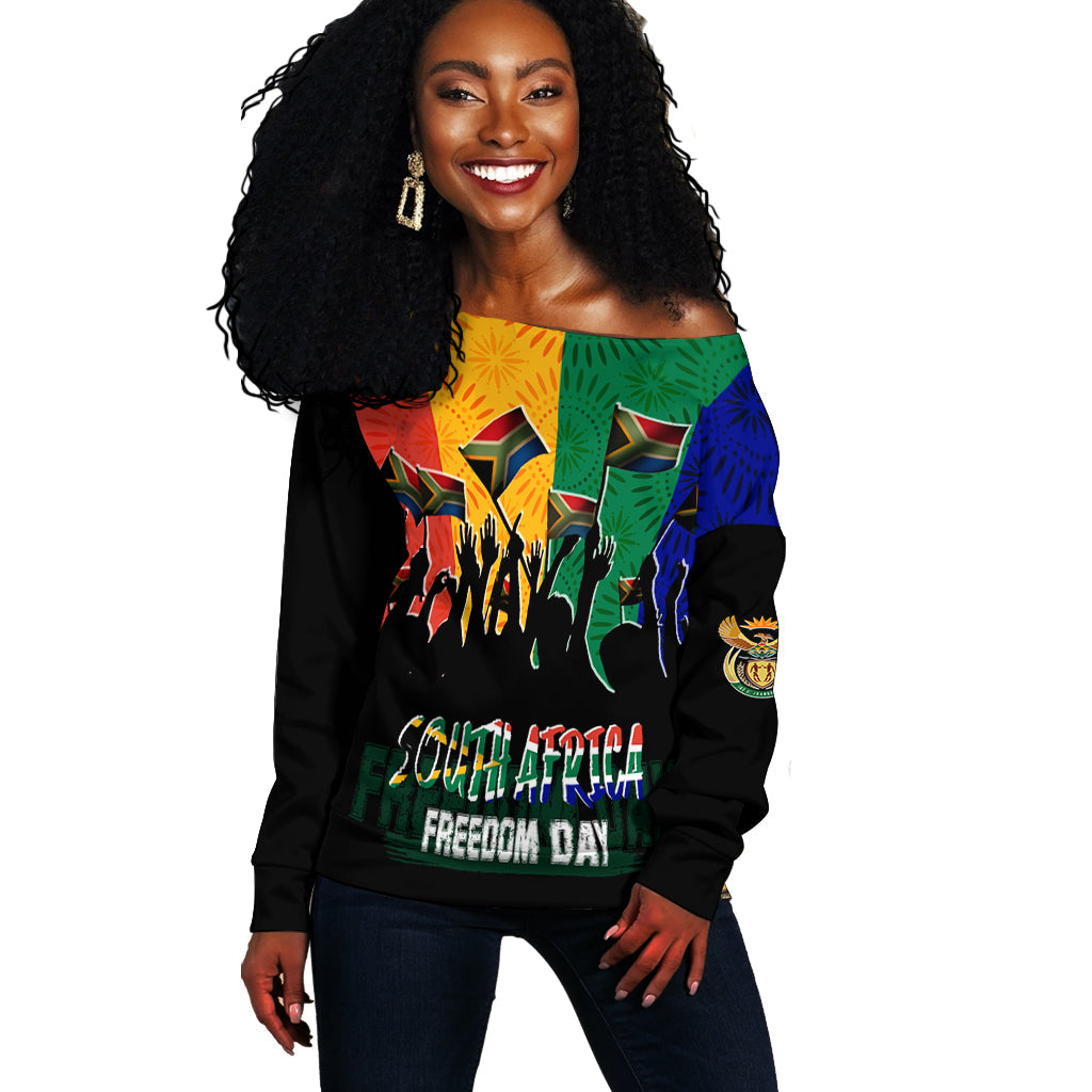 Women’s off-shoulder sweater with colorful graphic on black base, long sleeves