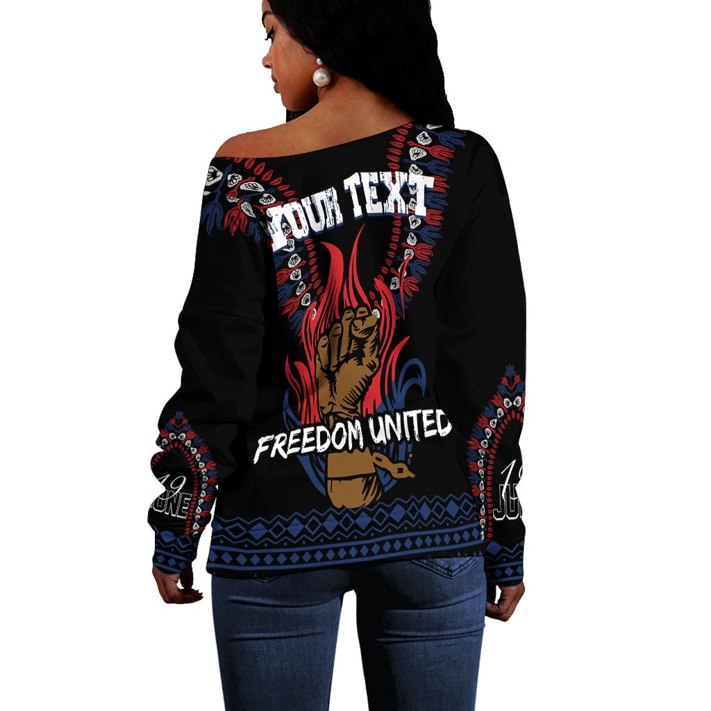 Black off-shoulder sweater back with Freedom United text and red/blue dashiki graphic