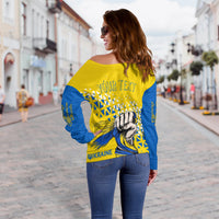 Yellow off-shoulder sweater back view with blue sleeves and 'YOUR TEXT' print