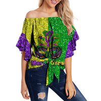 Off-shoulder waist wrap top in green, yellow, and purple glitter with bell sleeves