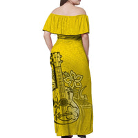 Yellow off-shoulder long dress, back view, ruffled neckline and ukulele graphic print