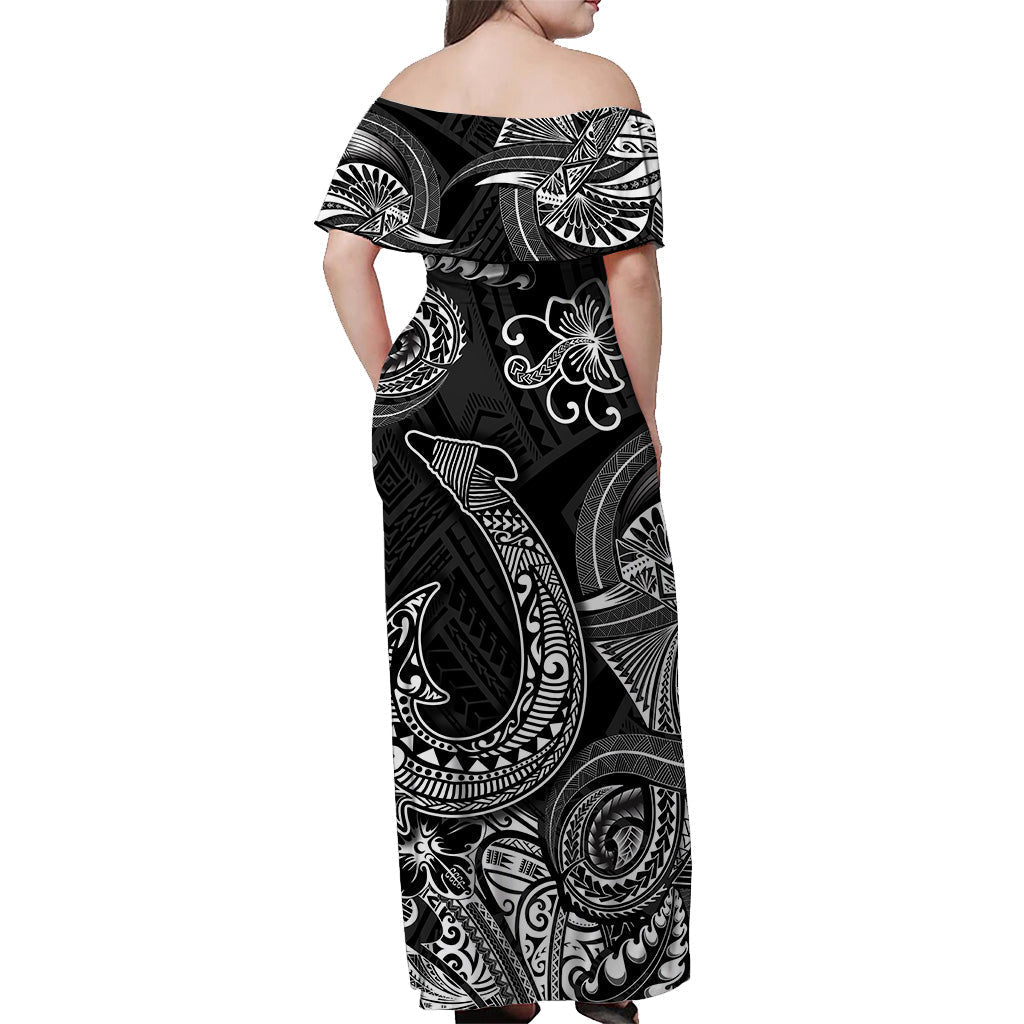 Back view women’s off-shoulder maxi dress, black with white tribal fishhook motifs
