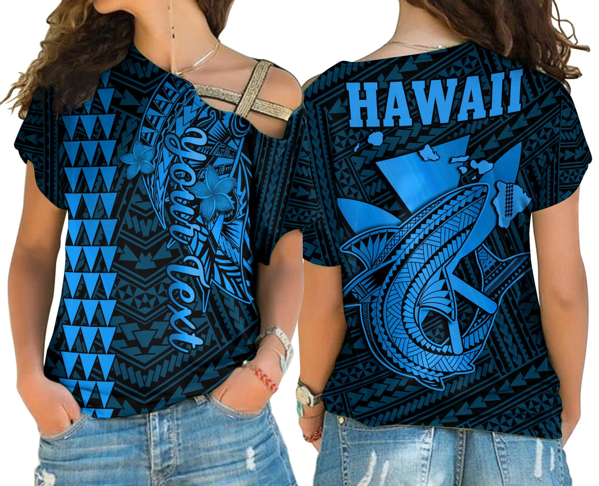Blue women’s cross-shoulder shirt with Hawaiian print, cold shoulder cutouts