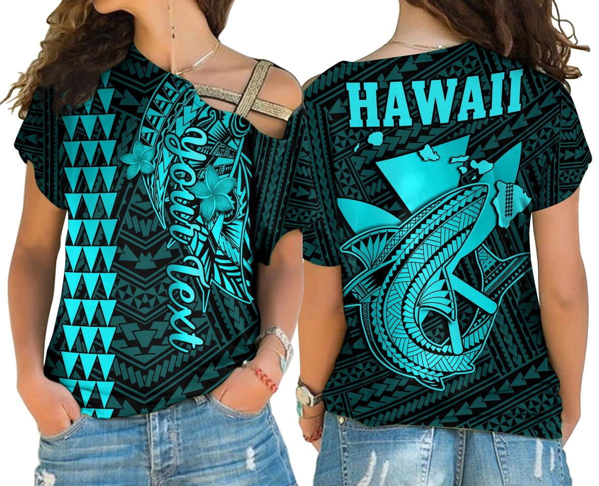 Turquoise cold-shoulder T-shirt with Hawaii graphic and tribal patterns on back