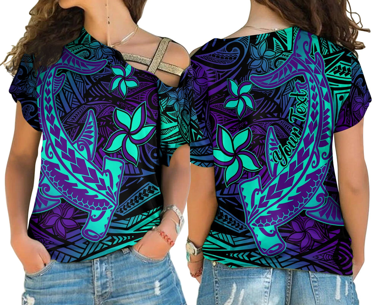 Purple off-shoulder cross-shoulder top with teal Polynesian tribal print and flowers