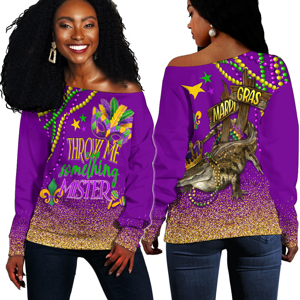 Purple off-shoulder sweater with Mardi Gras text and decorative bead border