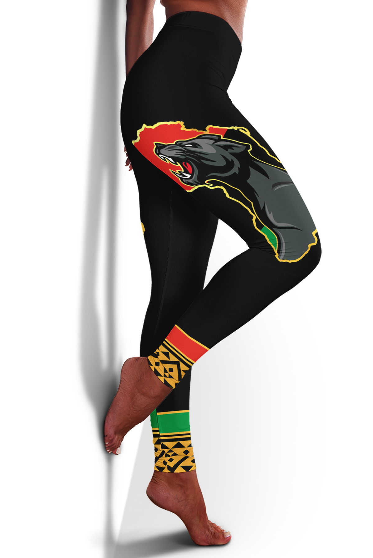 Black leggings with Africa map and panther graphic, red-yellow-green trim at ankle