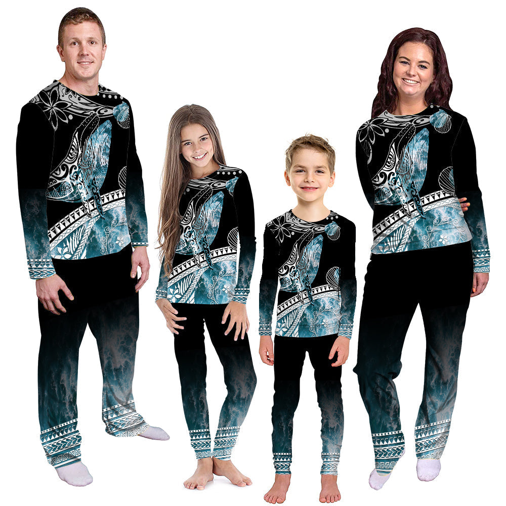 Ocean-themed pajama set with black long-sleeve top and matching blue wave/whale pants