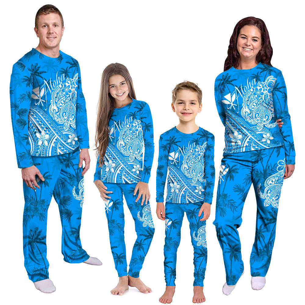 Blue aloha pajama set with palm tree and wave prints, long-sleeve top and pants.