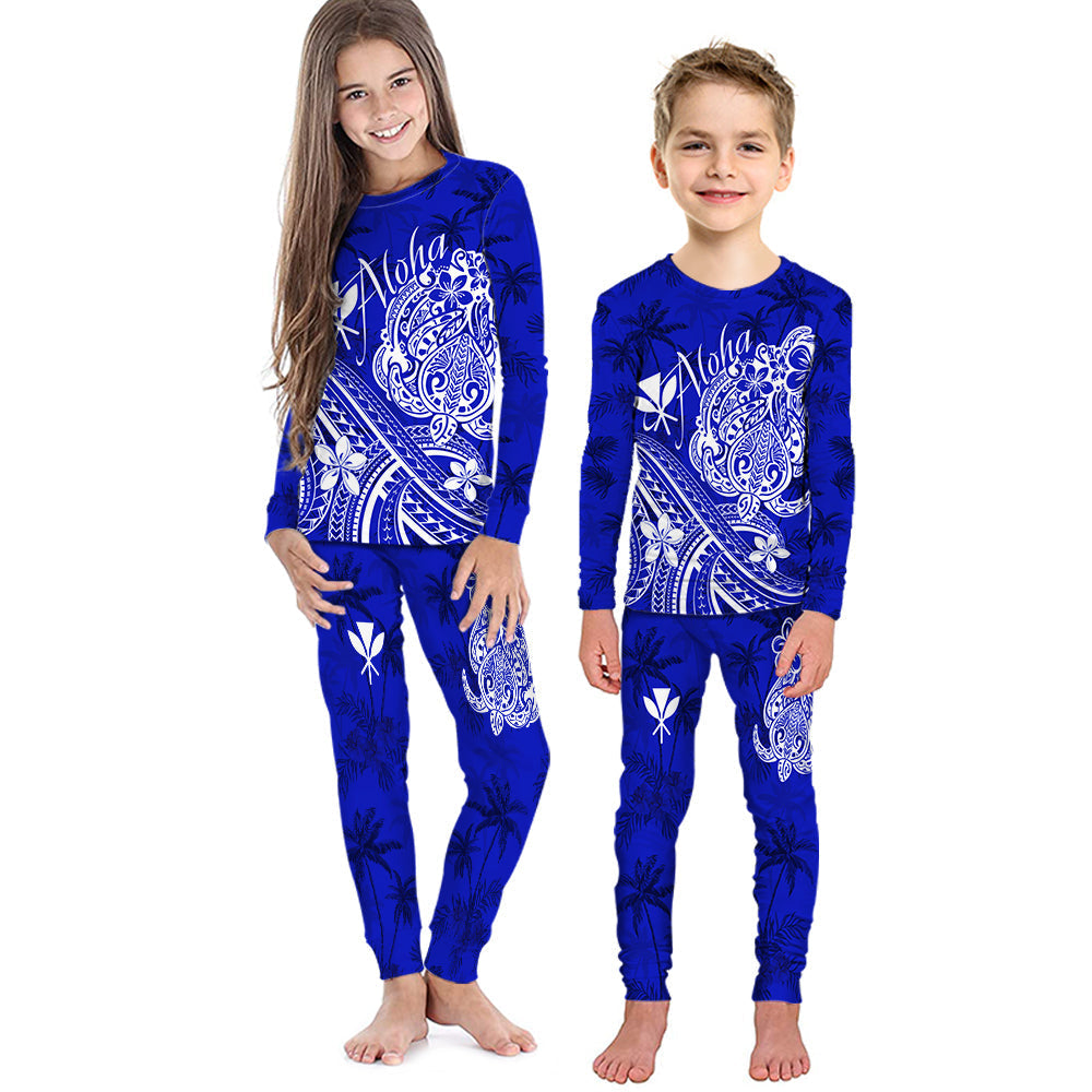 Kids long-sleeve pajama set in dark blue with white tropical palm and ornate print
