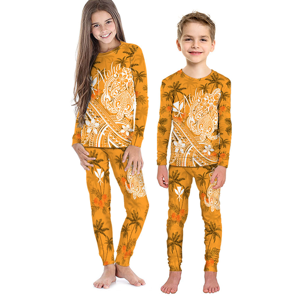 Kids orange pajama set with long-sleeve top and pants, palm trees and Aloha graphic