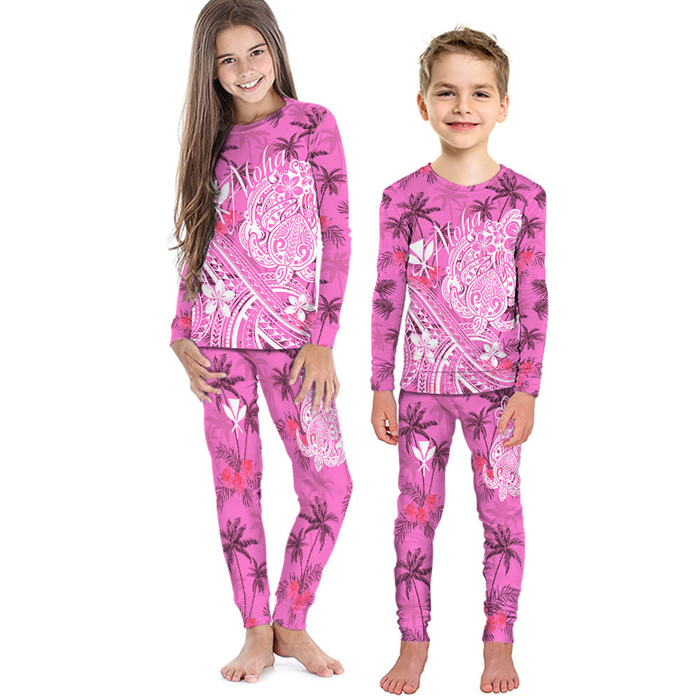 Kids pink long-sleeve pajama set with palm tree prints; matching pants.