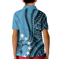 Kids blue polo shirt back with bold tribal panel print and star motifs