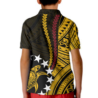 Kids black polo shirt back with yellow and red tribal print and white star graphic