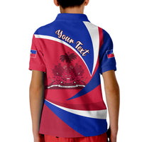 Kids polo shirt back with 'Youn Teks' Haiti flag design, blue collar