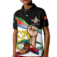 Kids black polo shirt with Eritrea Martyrs' Day print, fist and multicolor flag stripe
