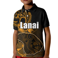 Kids black polo shirt with orange/gold 'Lanai' graphic on front