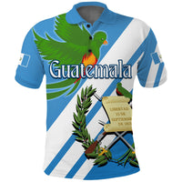 Blue polo shirt with white diagonal stripes and colorful quetzal bird graphic