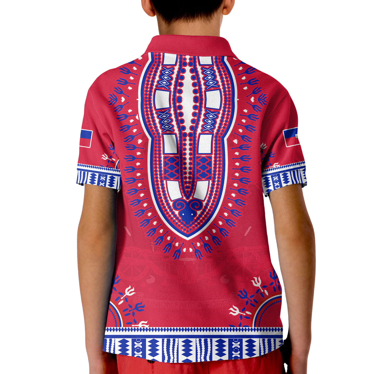 Kids red polo back with central blue ornate shield, navy patterns at sides