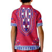 Kids red polo back with central blue ornate shield, navy patterns at sides