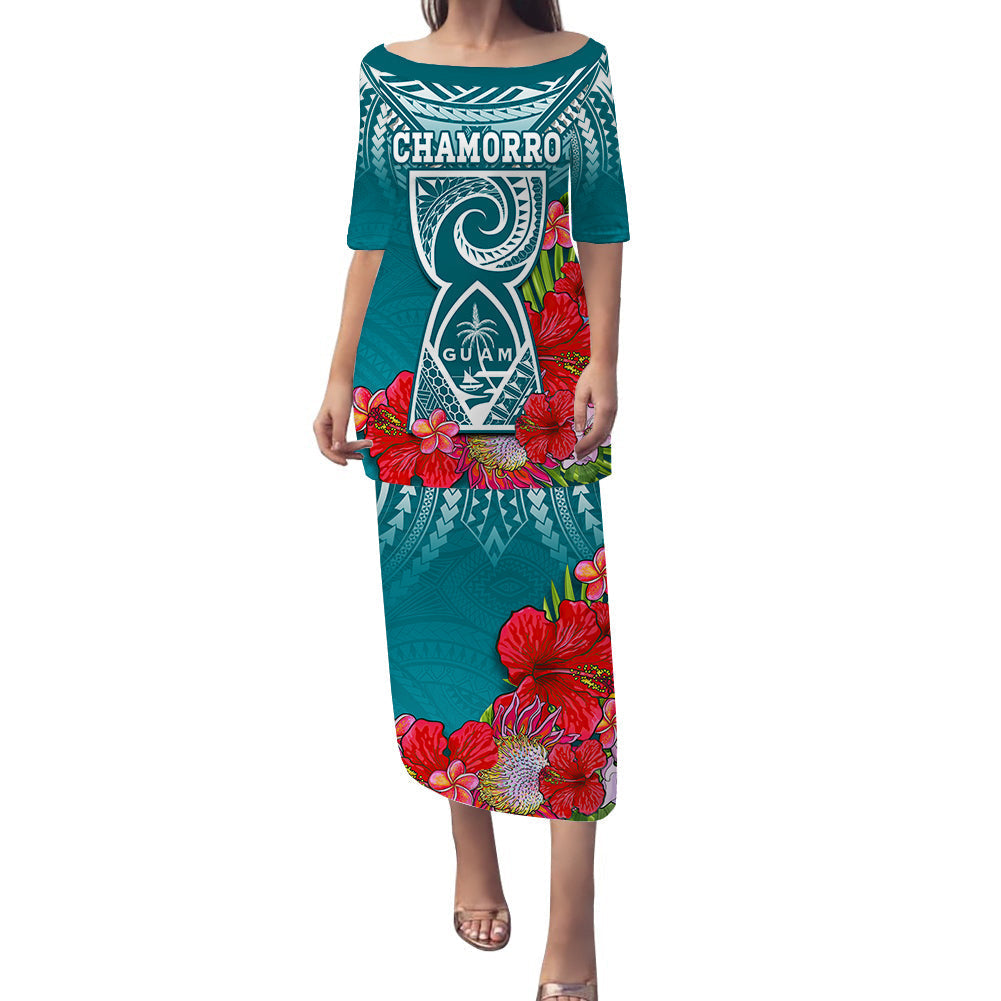 Turquoise long dress with floral print and Chamorro/Guam graphic, short sleeves