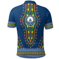Back of blue dashiki polo with long vertical medallion motif and patterned hem