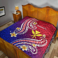 Quilt blanket with red and blue gradient, white paisley scrolls, and yellow flower-star motif