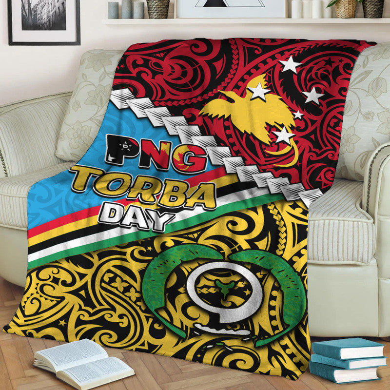 PNG Torba Day premium blanket with bold “PNG TORBA DAY” text, stars, and yellow-green heart emblem