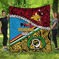 Multicolor quilt blanket with 'PNG TORBA DAY' graphic and star details