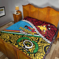 Multicolor quilt blanket with 'PNG TORBA DAY' graphic, green emblem and stars