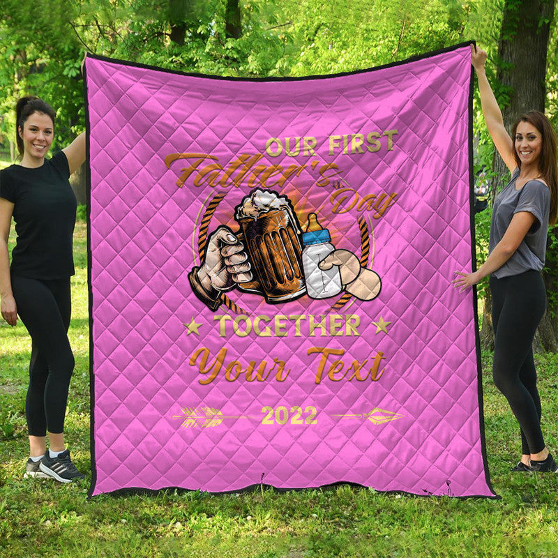 Pink diamond-quilt throw with “Our First Father’s Day” text and “Together”
