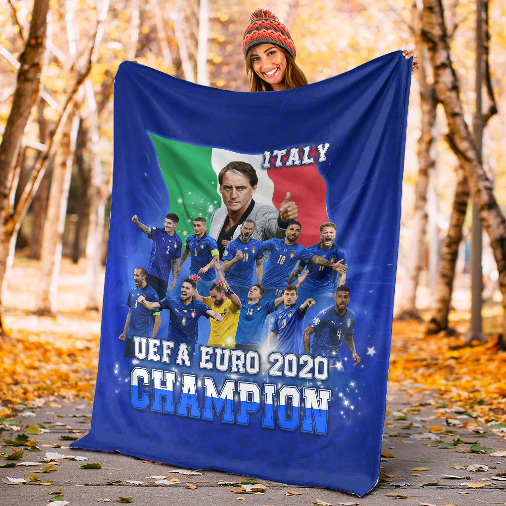 Blue Italy UEFA Euro 2020 Champions blanket held outdoors, showing Italy flag and players