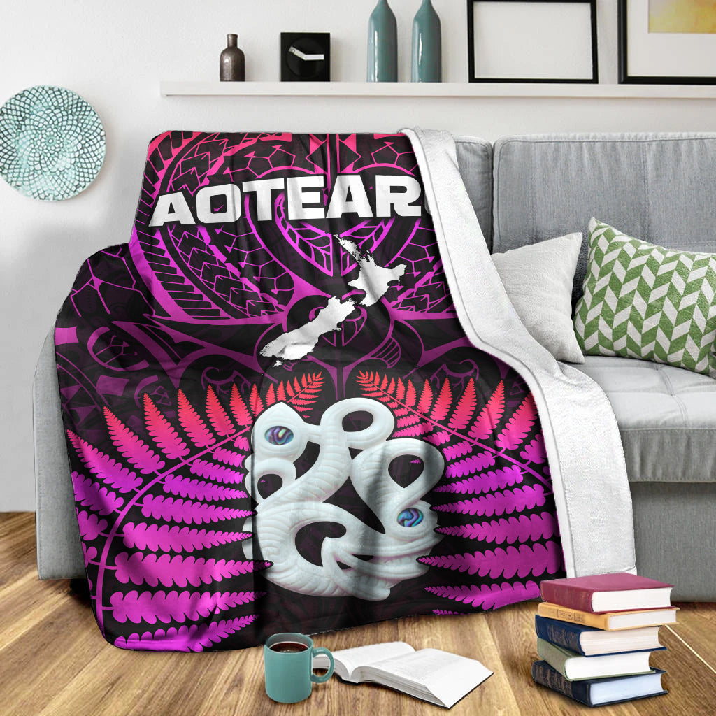 Purple and black premium blanket with fern pattern and white hei tiki face