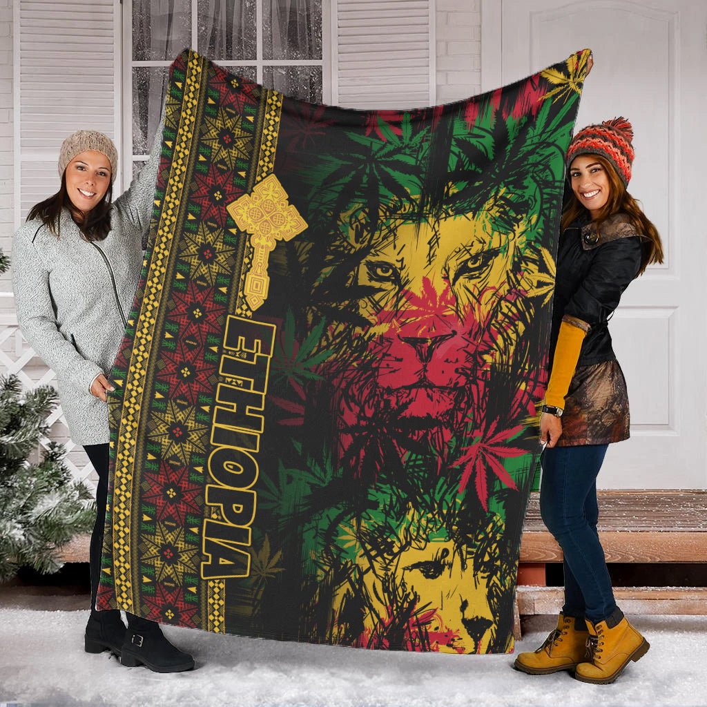 Lion reggae premium blanket draped, black base with green red yellow lion and Ethiopian cross stripe