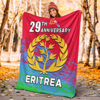 Red Eritrea 29th Anniversary blanket with gold tree emblem and ERITREA lettering