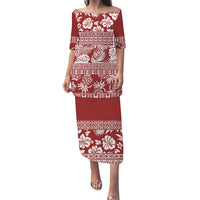 Red long dress with Polynesian-style floral and leaf print, short sleeves and round neckline.