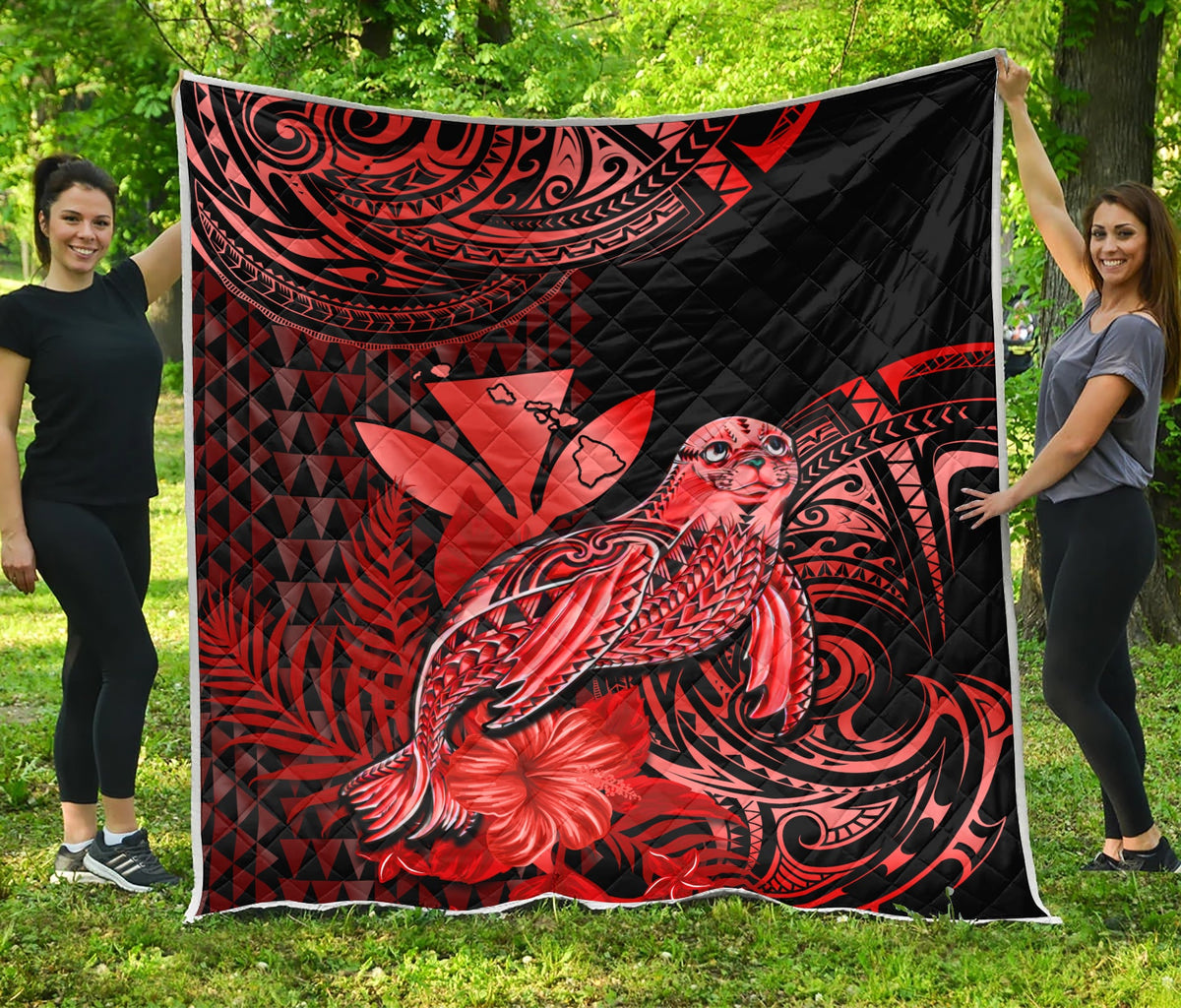 Red and black premium quilt with monk seal graphic and tribal swirls, diamond quilting