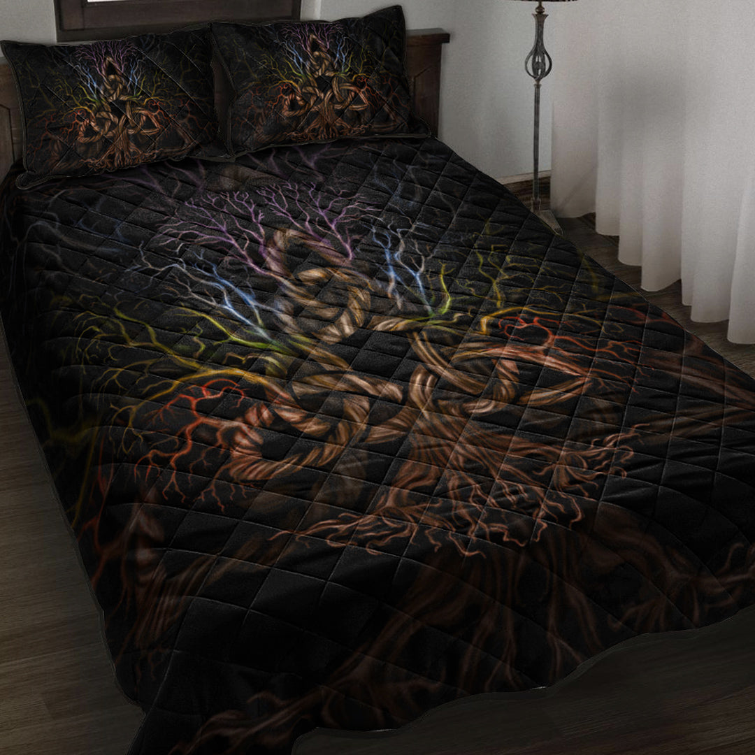 Black quilt bed set with colorful Tree of Life and triquetra motif, diamond stitched pattern