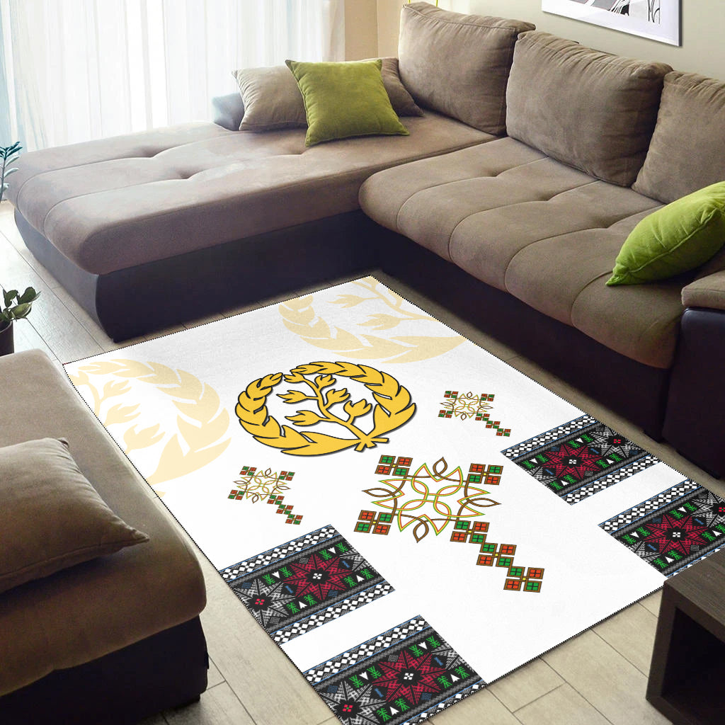 White rug with gold tree emblem and green/red/blue geometric corner panels