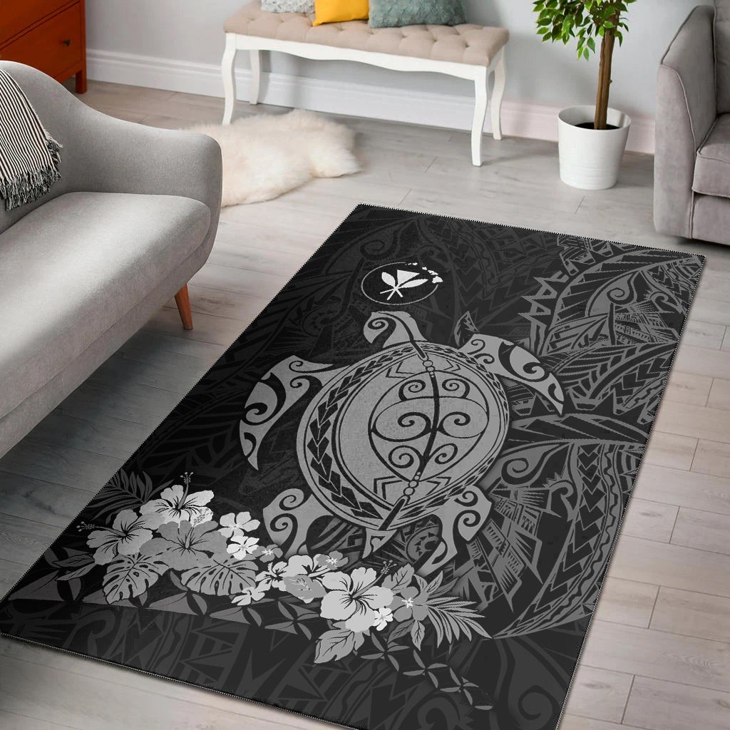 Gray Hawaiian area rug with sea-turtle emblem, tribal patterns, and floral accents