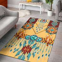 Cream area rug with turquoise, teal, red geometric dreamcatcher pattern