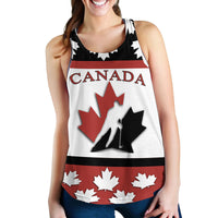 White women’s racerback tank, Canada text across chest with red maple leaf and black accents