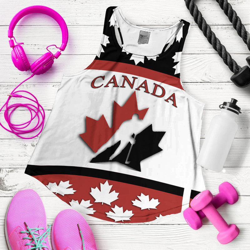 White Canada racerback tank with red maple leaf graphic and black/red stripes at hem