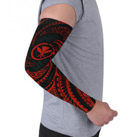 Red tribal wave arm sleeve on forearm, black base with tiki star and geometric bands