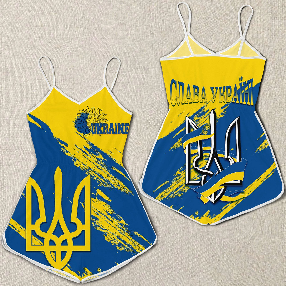 Blue romper with spaghetti straps, large yellow trident graphic and Ukrainian text print