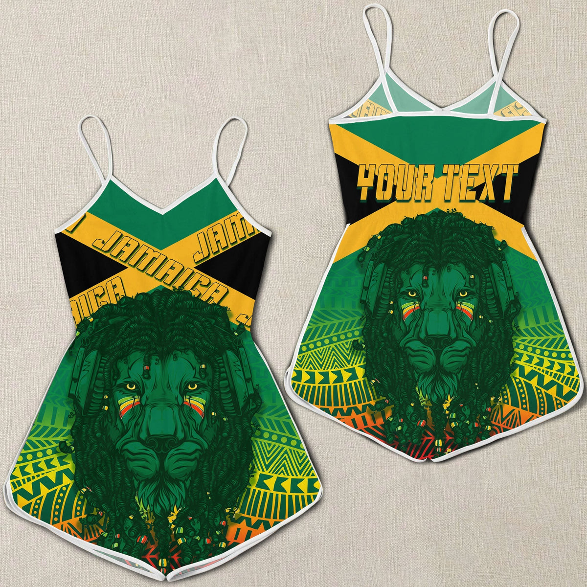 Green multicolor kids romper with spaghetti straps and large lion face graphic front