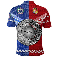 Blue-and-red polo with large circular emblem print on center, patterned short sleeves