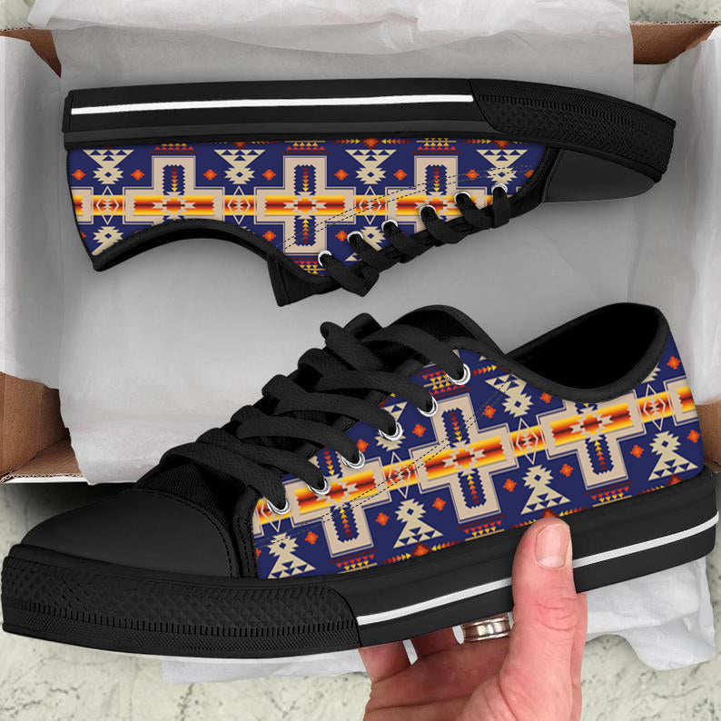 Low-top canvas sneakers with black sole, blue multicolor native pattern, black laces