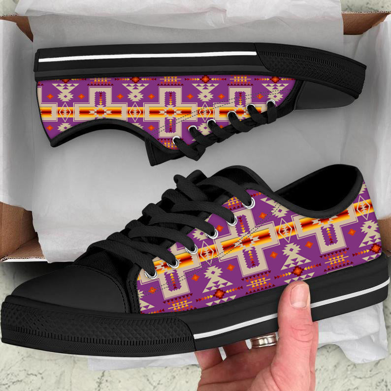 Light purple canvas low-top sneakers with tribal pattern, black laces and sole